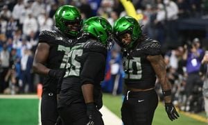 Oregon Ducks Triumph At Big Ten Championship To Seal Undefeated Season