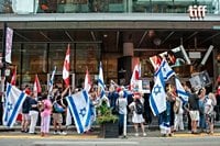 TIFF and director of Oct. 7 documentary reach agreement, with film back in festival