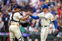Mariners alone atop AL West with 11-2 win over Angels, Astros' 8-2 loss to Braves