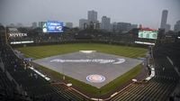 Milwaukee Brewers and Chicago Cubs postpone tonight's game due to rain in the Chicago area