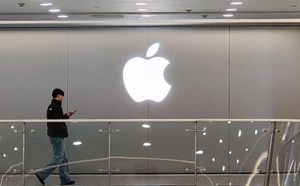 Apple Reports Record Revenue But IPhone Sales Dip