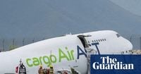 Hong Kong: two killed after cargo plane veers off runway into sea while landing