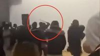 Primary school event is crashed by group of youths with knives