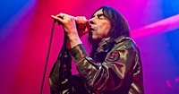 Primal Scream responds after Jewish charities slam antisemitic concert display