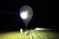 Hot-air balloons force shutdown of busy airport, affecting thousands