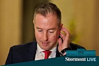 Education Minister accused of 'grinning like a panto villain' in Assembly throughout no-confidence motion over Israel trip