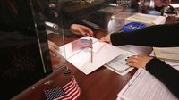 Trump admin halts green card applications in new vetting system
