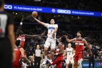 Magic cruise past Wizards