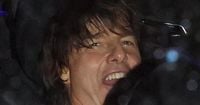 Tom Cruise desperately tries to hide girlfriend as they leave Beckham bash