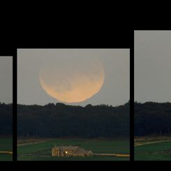 Eclipsed Moon Rising Over England