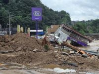 At least 14 dead in South Korea after heavy rains trigger landslide, floods
