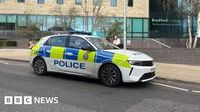 Man arrested after two injured in attack outside Bradford College - BBC News