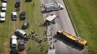 School bus overturns on I-77; 1 dead, 21 injured