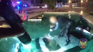 Phoenix Police Rescue Driver From Submerged Car