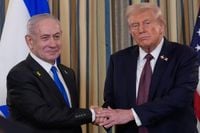 Trump signs an executive order vowing to defend Qatar in the wake of Israel’s strike