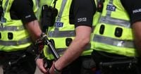 Three women charged under terror law after van driven into defence factory fence