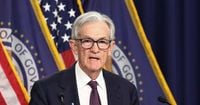 Fed sees rising risks to economy as it leaves rates unchanged