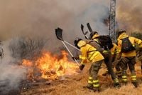 Spain adds 500 more troops to battle wildfires as country bakes under heatwave