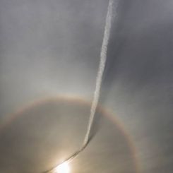  Plane Contrail and Sun Halo 