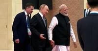 Putin and Modi seen holding hands ahead of meeting with Xi
