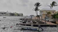 Imelda weakens after downing trees and power lines in Bermuda as a hurricane