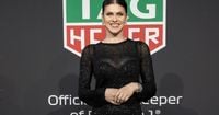 Alexandra Daddario Masters Sheer Dressing in Formula 1 Photos