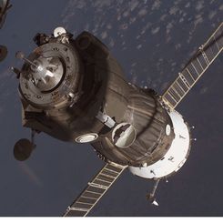 A Supply Ship Docks with the International Space Station