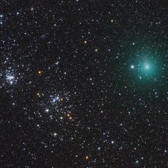 Comet Hartley Passes a Double Star Cluster