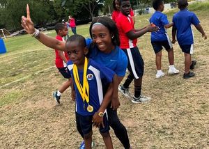Shelly-Ann Fraser-Pryce Dominates Parents Race At School