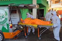 Death toll in Indonesian school collapse rises to 61 as more bodies are recovered