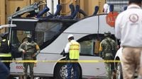 Freight train slams into a bus outside Mexico City and kills at least 10 people