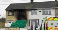 Woman and boy killed in house fire cops call 'murderous attack'