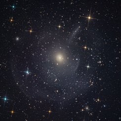  M89: Elliptical Galaxy with Outer Shells and Plumes 