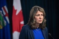 Albertans brace for province’s new COVID vaccine program, requiring many to pay out of pocket