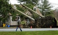 Residents pick up the pieces after devastating storms scour the US South and Midwest