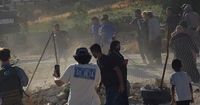 Palestinian activist Odeh Hadalin filmed moment he was fatally shot by Israeli settler | The National