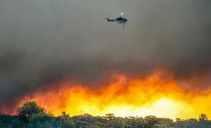 Coastal Communities Threatened By Devastation As Bushfire Rages