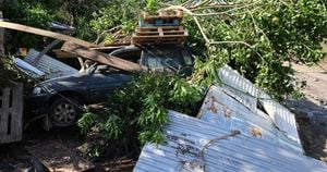 Manuel Valls Visits La Réunion After Devastation From Cyclone Garance