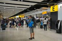 Britain beefs up travel warnings over US border enforcement