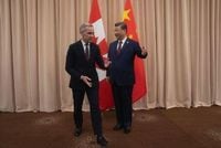 Canadian Prime Minister Mark Carney, left, meets Chinese President Xi Jinping at the start of a meeting in Gyeongju, South Korea Friday, Oct. 31, 2025. (Adrian Wyld/The Canadian Press via AP)