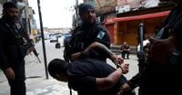 At least 64 killed in Rio police raids ahead of climate conferences