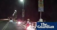 Dashcam footage shows people rocked off their bikes as earthquake shakes the Philippines – video