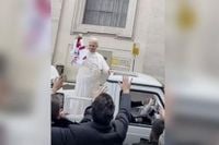 Pope Leo XIV catches and waves Tyrone GAA shirt outside the Vatican