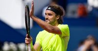 Tsitsipas edges Korda to return to quarter-finals