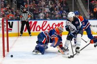 Connor’s overtime winner lifts Jets past Oilers, who lost McDavid late