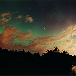 Aurora Over Clouds