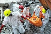 Death toll in Indonesian school collapse rises to 60 as more bodies are recovered