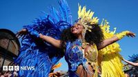 Notting Hill Carnival parade dances through west London