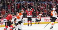 Blackhawks halt 7-game slide, extend Flyers' woes