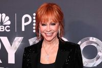 Reba McEntire Rocked a Party Ponytail with Dramatic Bangs & Sparkly Jacket at Opry 100